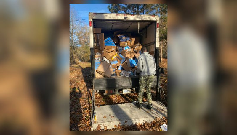 FedEx driver questioned about hundreds of packages in woods