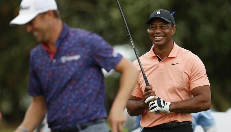 Woods returns with 3 shots that look like the Tiger of old